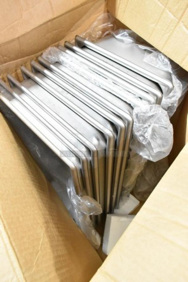 Box of Camwear bin lids in new condition, showing protective packaging. Auction includes Dixie cutlery dispenser.