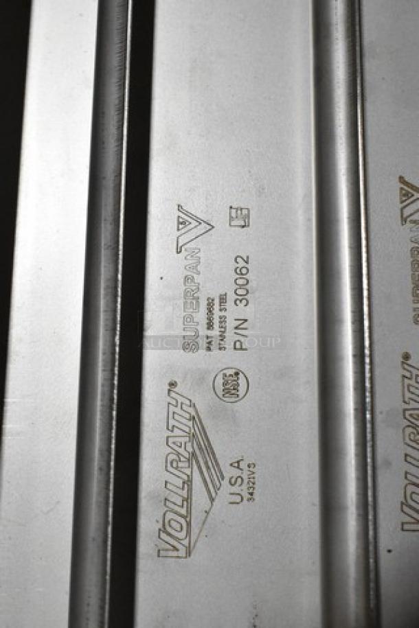 Alt text: Vollrath Super Pan V stainless steel part, shown with product markings including P/N 30062 and "Made in USA."