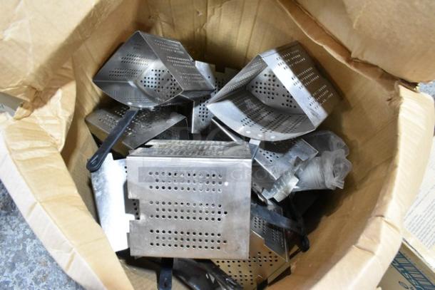 Box of new scratch and dent items including Dixie cutlery dispensers and Camwear bin lids, mixed condition.