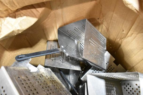 Cardboard box filled with metal perforated scoops, scratch and dent condition, ideal for commercial use.