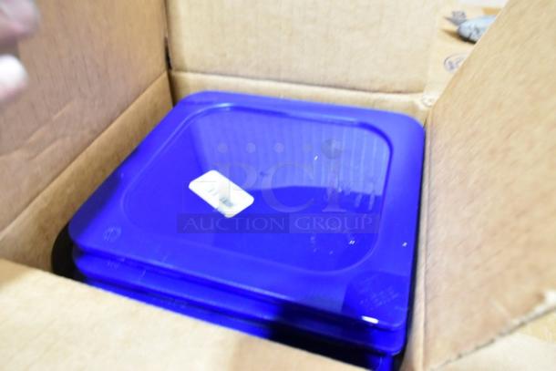 Box containing blue Carlisle Food Pan Smart Lids, noted as brand new scratch and dent condition, stacked and ready for auction.