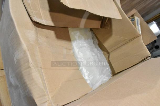 Cardboard box containing new Carlisle food pan smart lids and to-go containers, visibly open with packing material inside.