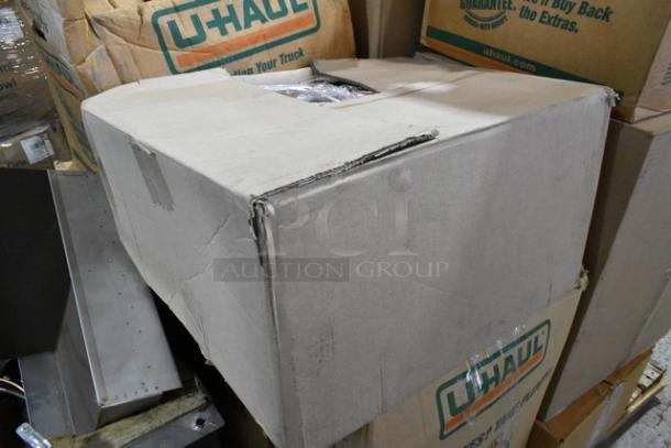 Cardboard boxes labeled "U-Haul," containing 25 new scratch and dent items, including Carlisle food pan lids and to-go containers.