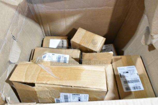 Cardboard box containing 25 scratch and dent boxes of Carlisle Food Pan Smart Lids and to-go containers. Labels visible.