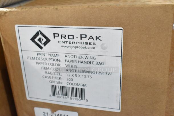 Alt text: "Pro-Pak paper handle bag box label, white paper, size 12x9x15.75, origin Colombia, case of 200, item code ANOTHERWING12915W."