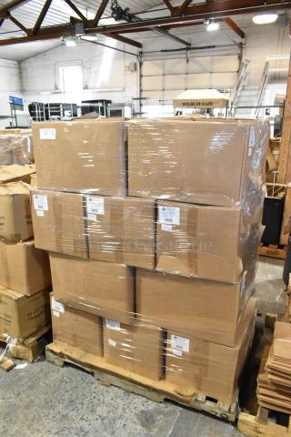Pallet of 20 new scratch and dent boxes, including ProPak paper handle bags, wrapped in plastic in warehouse setting.