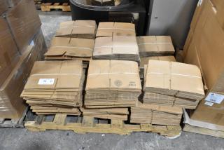 Bundles of 16 brand new 8x6x4 cardboard boxes on a pallet, labeled #864, in excellent condition.