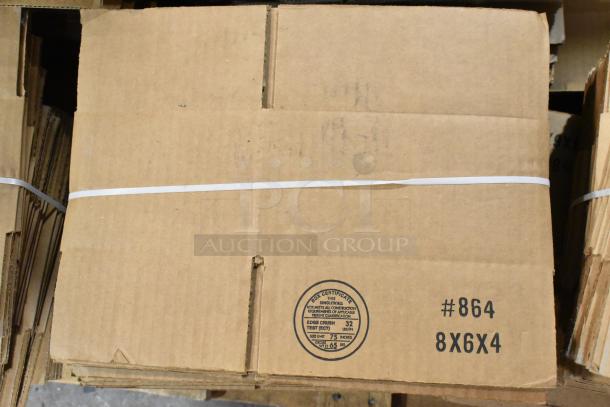Bundles of new scratch and dent cardboard boxes, size 8x6x4, labeled #864. Includes certification mark.