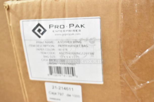 Cardboard box with ProPak label indicating "Another Wing Paper Handle Bag," white, size 12x9x15.75, origin Colombia.