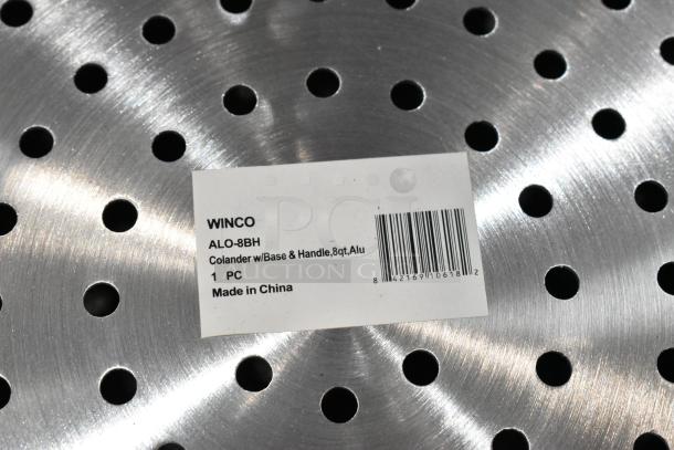 Winco ALO-8BH aluminum colander with base and handle, 8 qt, includes label indicating "Made in China."