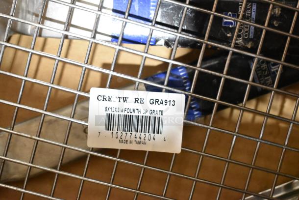 Metal grate with label marked "CRE GRA913, 8x12x3/4 FOURTH SP GRATE, Made in Taiwan." Part of auction lot.