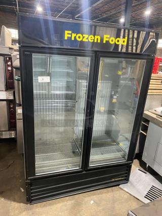 True GDM49F commercial double glass door freezer with poly-coated wire racks, model GDM-49F, SN: 1-4353979, for frozen food.