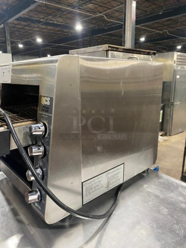 Star Manufacturing Holman QCS-2-60HC stainless steel countertop conveyor toaster, model QCS260HC, 208V, 1 phase, on legs.