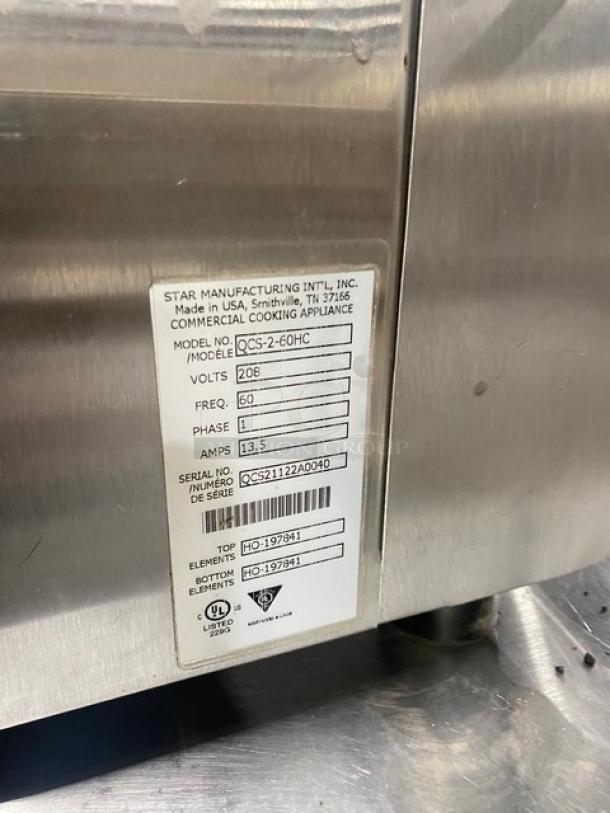Star Manufacturing Holman QCS-2-60HC Stainless Steel Conveyor Toaster, Commercial Electric, 208V, 1 Phase, on legs.