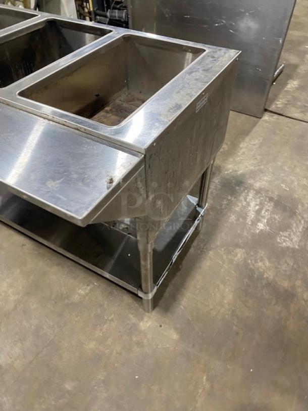 Diamond GST4830 stainless steel 3-well steam table, natural gas, individual controls, undershelf, tray slide, on legs.