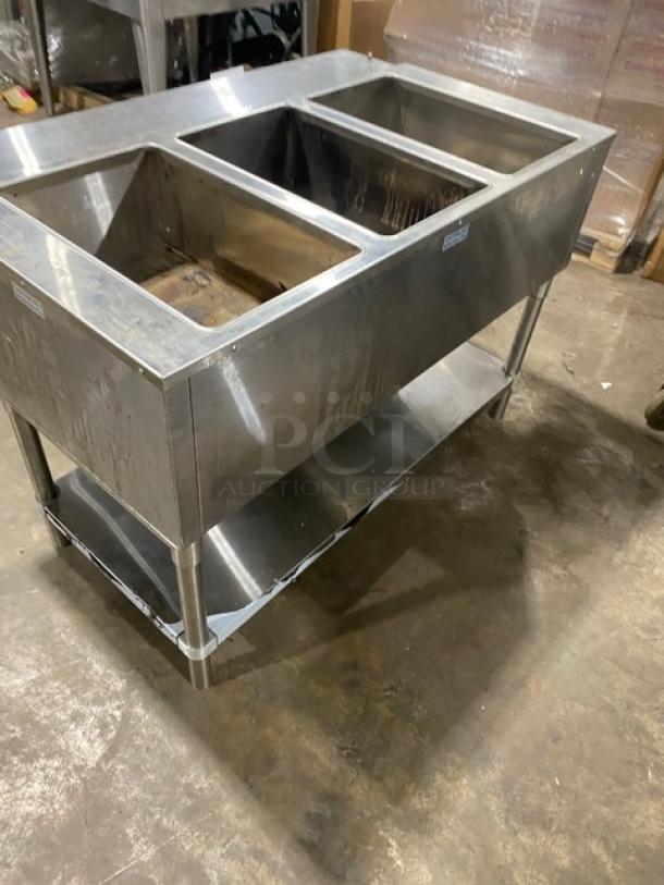 Diamond Commercial Stainless Steel 3-well steamtable, natural gas, model GST48-30, with undershelf, tray slide, on legs.