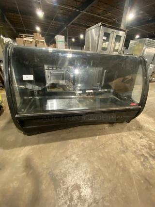 Tor-Rey TEM200NG black curved glass refrigerated bakery display case, rear double glass sliding door, 127V, used condition.