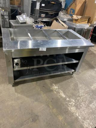 Cecilware commercial stainless steel 4-well hot food steamtable with tray slide, enclosed double shelf base, on legs.