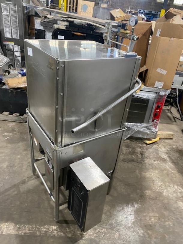 Jackson TempStar Series stainless steel commercial door-type dishwasher, electric-powered, on legs. Good condition.