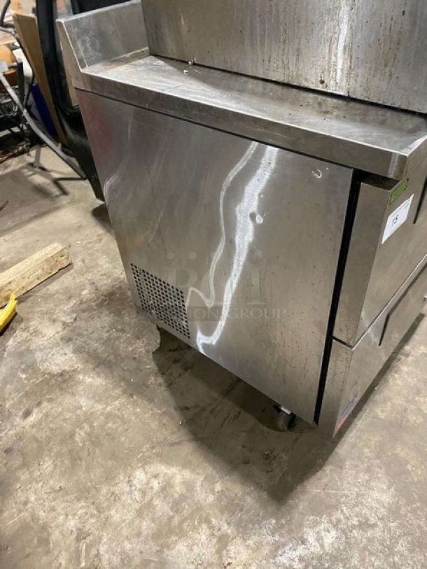 Turbo Air Super Deluxe 2 Drawer Refrigerated Worktop Cooler, Model TWR-28SD-D2-N, stainless steel, with backsplash, on casters.