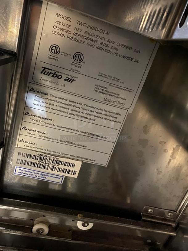 Turbo Air TWR-28SD-D2-N label showing model, voltage (115V), safety warnings, and serial number H2W2R2DG8720.