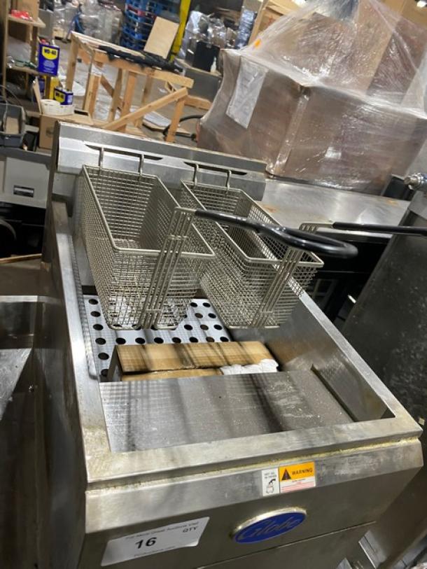 Globe GF30G stainless steel natural gas countertop deep fat fryer with backsplash, basket hanger, and fry baskets. Model SN: 1521064402.