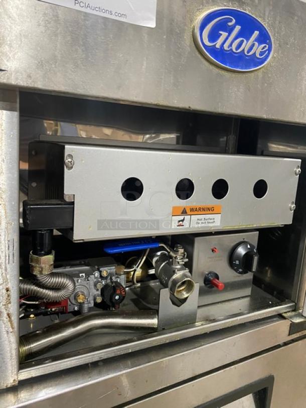 Globe GF30G countertop deep fat fryer, stainless steel, natural gas, 2021 model, with backsplash and basket hanger.