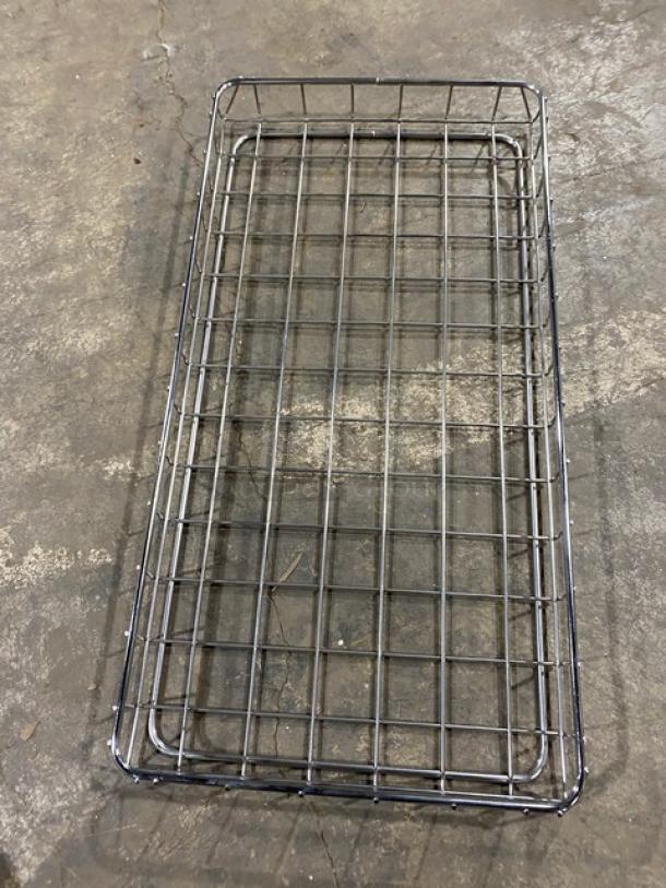 Chrome plated full-sized bagel/pastry wire rack. Durable condition, rectangular shape, grid design for commercial use.