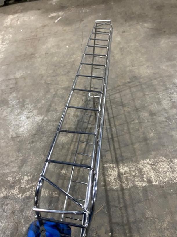 Commercial chrome plated full-sized bagel/pastry wire rack, sturdy construction, excellent condition, grid design for storage.