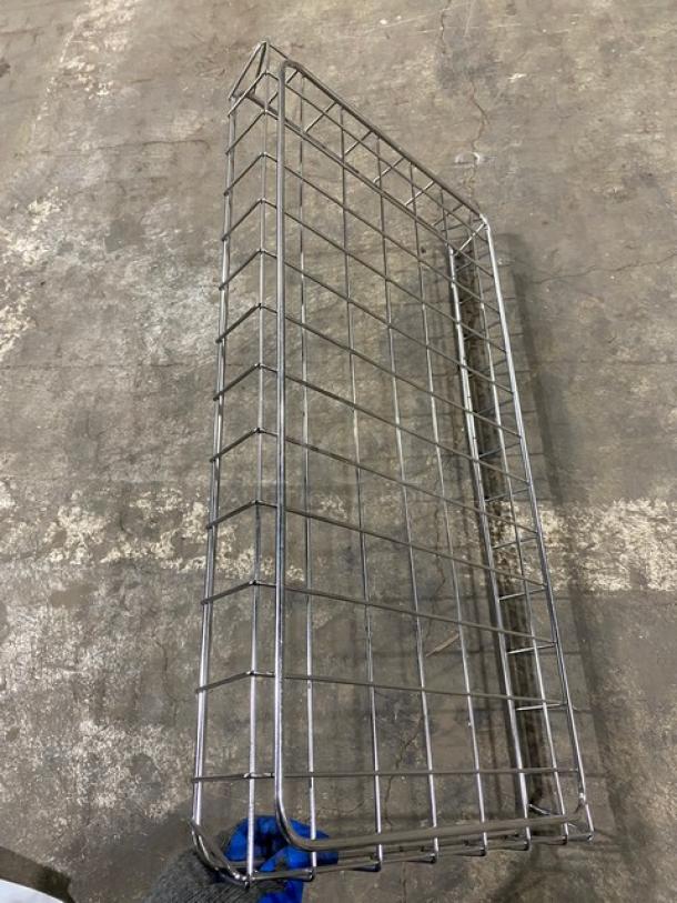 Commercial chrome plated full-sized bagel/pastry wired rack, featuring a sturdy grid design. Excellent condition.