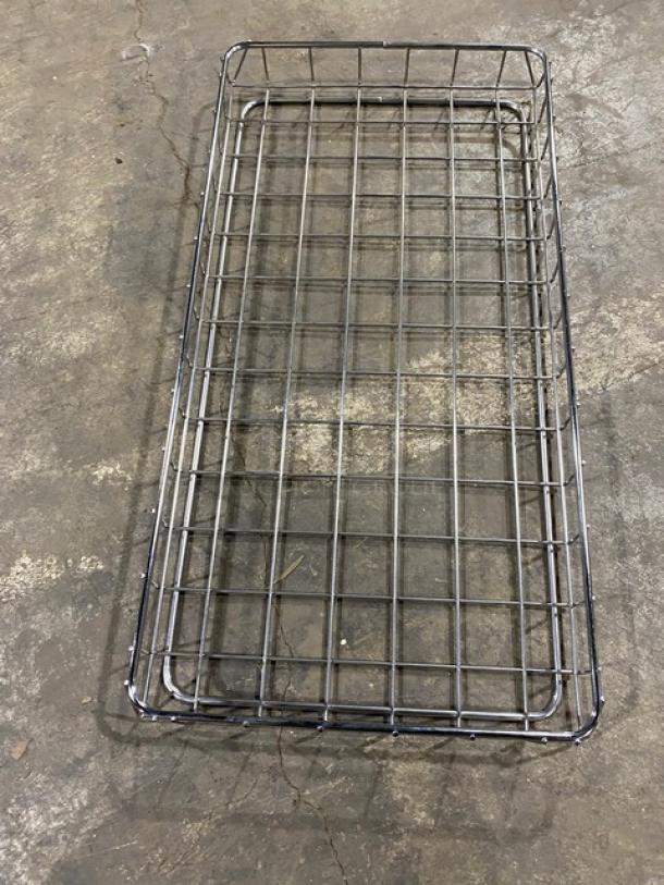 Commercial chrome plated full-sized bagel/pastry wire rack, grid design, in good condition, for bakery display.
