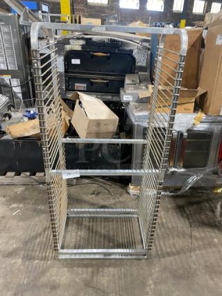 Commercial heavy-duty pan holding rack, stainless steel, 20 slots, sturdy construction, good used condition.
