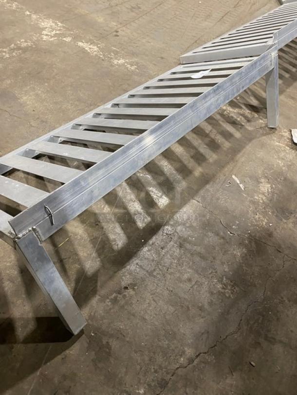 Commercial aluminum T-Bar wall shelf, silver, lattice design, sturdy construction, suitable for industrial use, excellent condition.