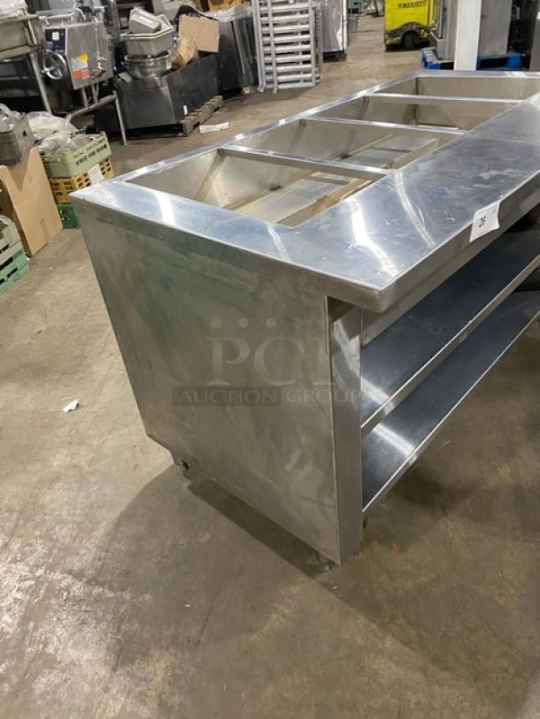 Cecilware commercial 4-well stainless steel steam table with enclosed double shelf base on legs, in used condition.