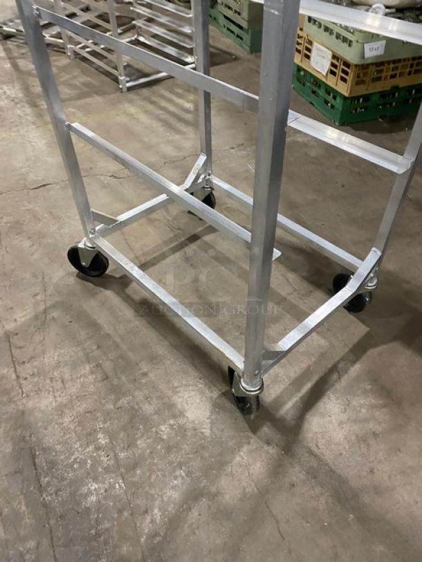Channel Commercial Aluminum Lug/Bus Rack, Model 506LA, on casters. Durable metal frame, ideal for transport and storage.