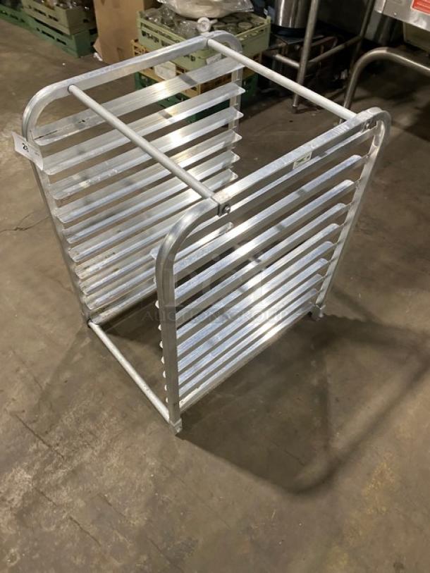 Commercial heavy-duty pan holding rack, aluminum construction, multiple shelves, excellent condition, industrial use.