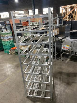 Channel heavy-duty pan holding/cooling rack with multiple shelves, on sturdy legs, in good condition, commercial use.
