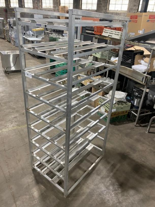 Channel heavy-duty pan holding rack on legs, commercial-grade, multiple shelves, sturdy metal construction, used condition.