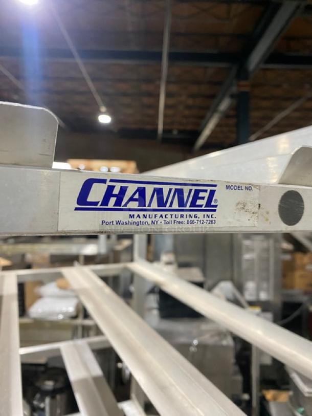 Channel commercial heavy-duty pan holding/cooling rack on legs; features multiple shelves, visible Channel label.