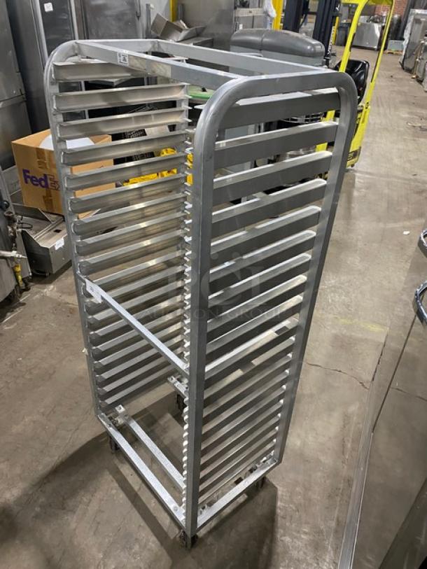 Commercial heavy duty pan holding/cooling rack on casters; metal, multi-shelf, industrial, good condition, mobile.