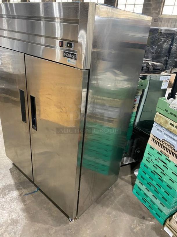 Dukers Commercial Stainless Steel 2 Door Reach-In Freezer, Model D55AF, with poly-coated wire racks, on casters.