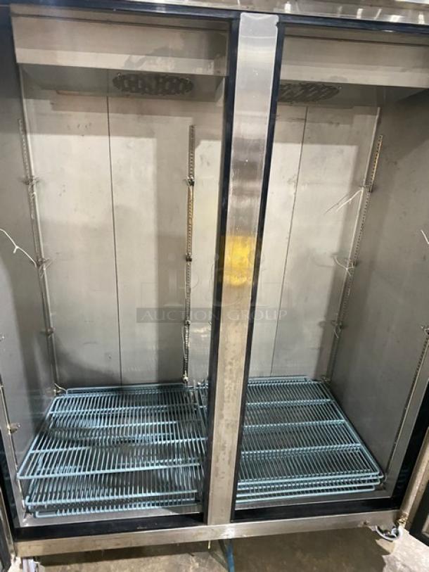 Dukers D55AF commercial stainless steel double door freezer with poly coated wire racks and casters, model D55AF, 115V.
