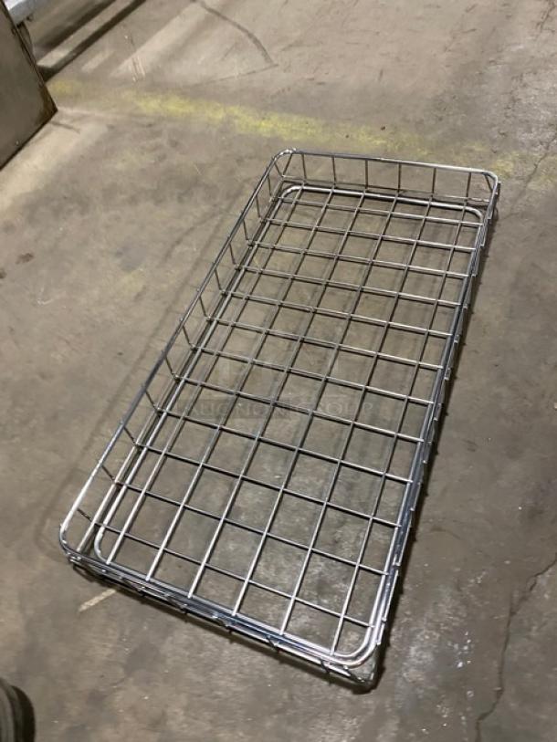 Chrome-plated wired rack for bagels/pastries, full-sized, in good condition. Grid design for ventilation and durability.
