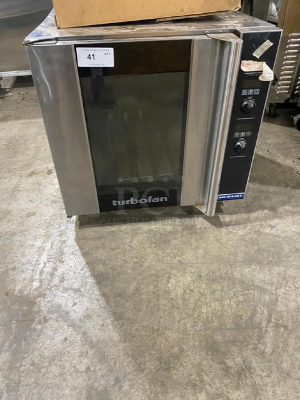 Moffat Turbofan Series stainless steel countertop convection oven with pan holding slides, controls panel, and legs.