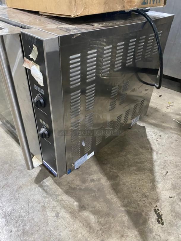 Moffat Turbofan Series stainless steel countertop convection oven with pan slides and legs. Electric-powered. Good condition.