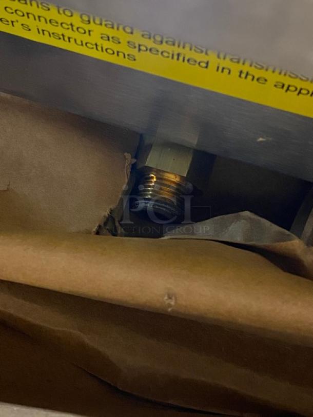 New Krampouz commercial stainless steel natural gas crepe maker, countertop model. Unopened, visible attachment component.