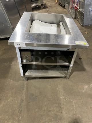 Commercial stainless steel single-well hot food/steam table with double undershelf base on legs. Good condition.