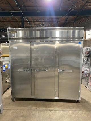 Continental Commercial Stainless Steel 3-Door Reach-In Freezer, Model 3F, with racks, pan slides, casters. Serial: 15127134.