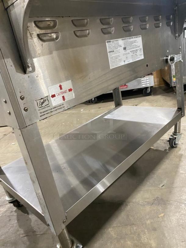 Duke AeroHot Series WB303, 3-well steamtable, stainless steel, undershelf, casters, cutting board, model SN: 10249949.