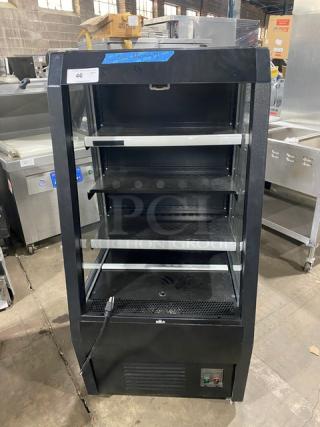 Late model black refrigerated grab-and-go merchandiser with multi-tier shelves, pull-down night curtain, on casters, Model 189MAC26HC.